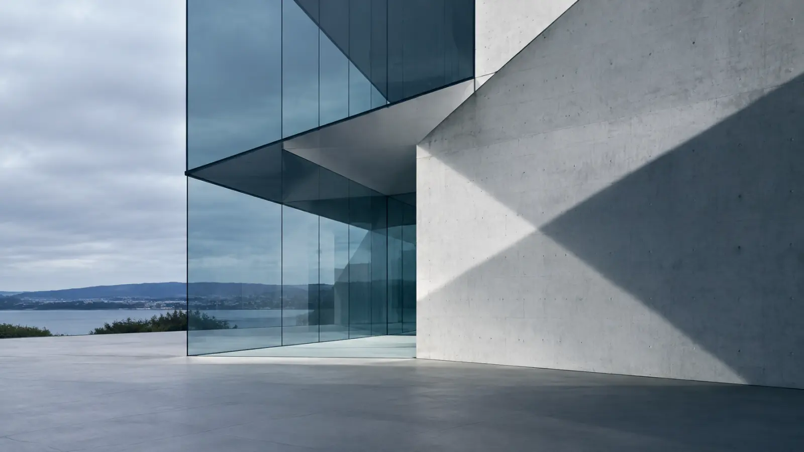 Geometric glass and concrete architecture in cool daylight